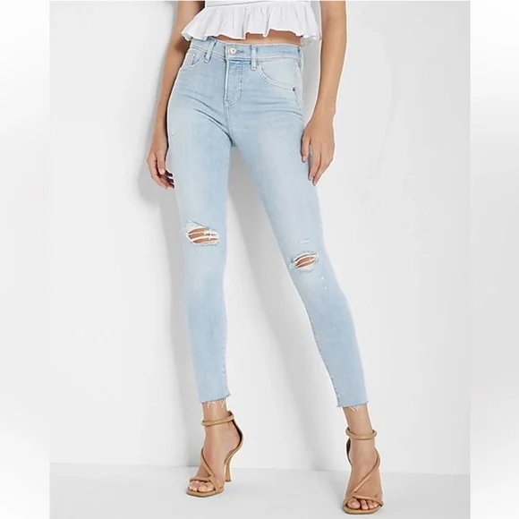 NWT Express Size 18 Light Wash/ Mid Rise Ripped Raw Hem Skinny Jeans